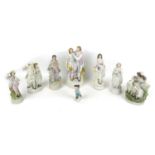 A group of eight bisque and ceramic figurines, including a 19th century Royal Berlin (KPM) factory