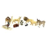 A group of nine Beswick animal figurines, comprising a camel, number 1044, a Lion family, numbers,