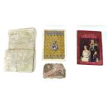 A Queen Victoria Jubilee book of reliefs celebrating her reign 1837-1887, a vintage linen backed map
