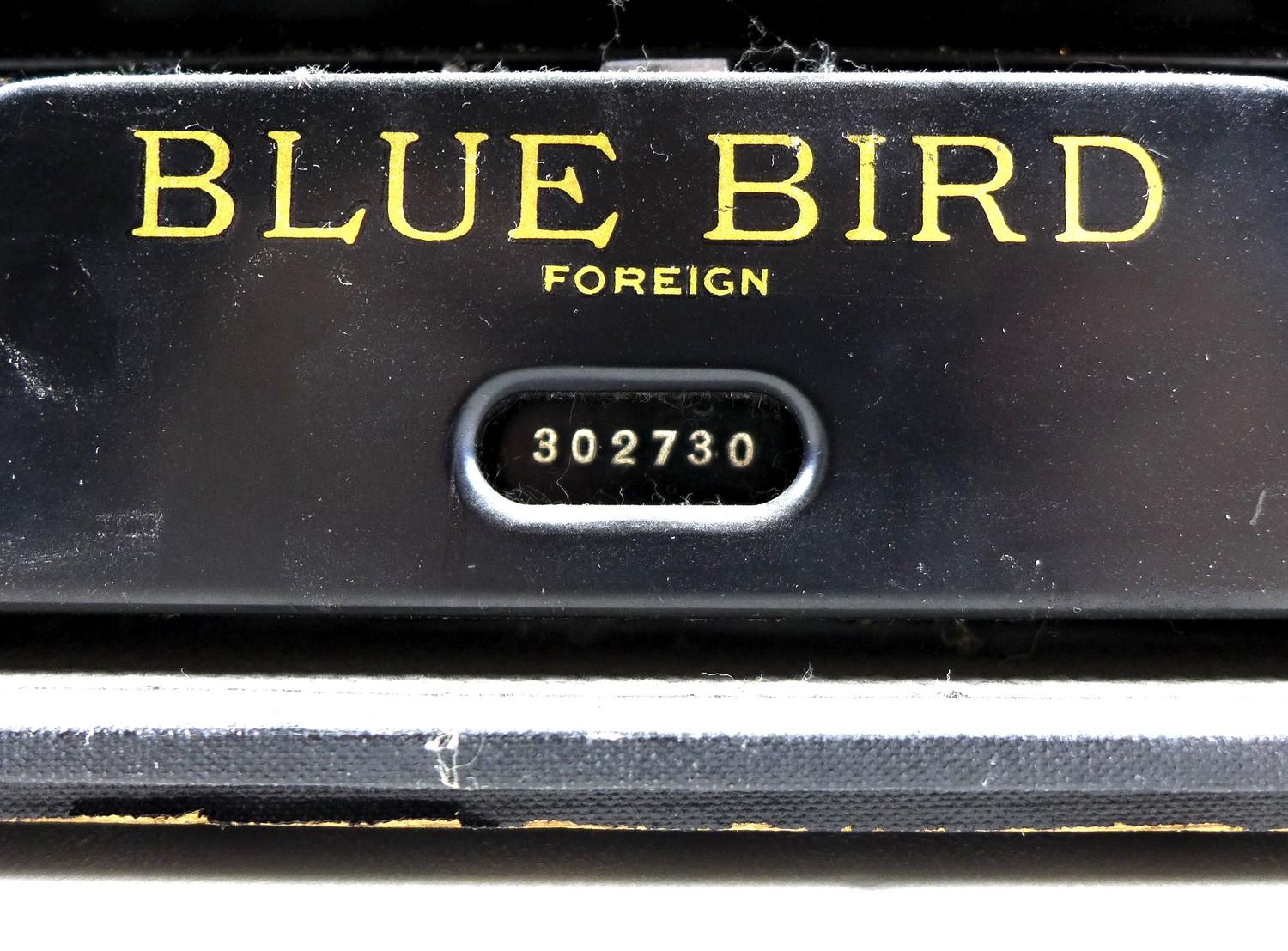 A vintage Blue Bird typewriter, with black finish, serial 302730, in black carry case. - Image 4 of 4