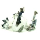 A group of three Lladro figurines, comprising 'The Princess and The Swan', number 5705, 24cm high,