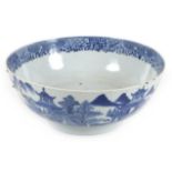 A Chinese porcelain blue and white bowl, Qing Dynasty, 18th century, the body painted with houses in