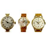 A group of three lady's wristwatches, comprising a 9ct gold Cyma Cymaflex with silvered dial, gold