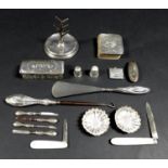 A collection of Victorian and later silver vertu, including a miniature manicure set with silver