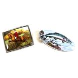 Two contemporary silver pill boxes with decorative lids, comprising an oval box with hand painted
