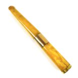 A mid 20th century 9ct gold mounted amber cheroot holder, with yellow metal band to its middle, a/f,