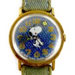 A vintage Timex 'Snoopy Tennis' mystery dial wristwatch, circa 1960s, circular blue 'denim' dial