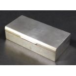A George VI silver cigarette box, of rectangular form, with engine turned decoration to the top,