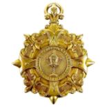 A rare Victorian 15ct gold sporting winners medal, of circular form with a central relief cast