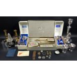 A collection of silver plated wares and collectables, including a Sheffield Plate candlestick, 16 by