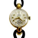 A Tudor Royal 9ct gold cased lady's wristwatch, circa 1950s, the circular cream dial with raised