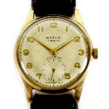 A Hefix 9ct gold cased gentleman's wristwatch, circa 1950s, circular silvered dial, raised gold
