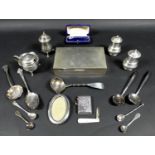 A collection of silver items including a cigarette box, cedar lining, plain rectangular body,