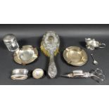 A group of silver items, comprising a pair of circular ashtrays, with beaded rims, Adie Brothers