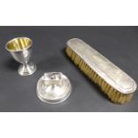 A group of thee silver items, comprising a silver egg cup with gilt interior, S J Rose & Son,