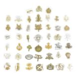 A collection of forty-five WWI and later British Army Yeomanry and other regimental badges,