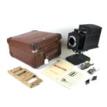 An Ensign Optiscope No 6 Lantern Slide Projector, a/f missing lens, 31cm high, with wooden Jay-Nay