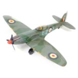 A large scale model of a WWII British Spitfire, with pilot, markings, 112 by 100 by 35cm high.