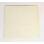 A first pressing of The Beatles 'White Album', numbered '0019159', (PMC 7067, side 1 XEX 709-1, side
