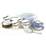 A Royal Worcester part tea service in the Howard pattern, comprising eight cups, 8cm high,
