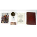 A group of military and commemorative items and ephemera, comprising a silk handkerchief