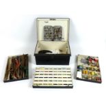 An Edwardian metal fly fishing tackle box, by C. Farlow & Co Ltd London, with three lift out trays