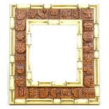 Ron Hitchins (British, 20th century) rectangular wall mirror inlaid with abstract terracotta