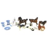 A collection of five Beswick animal figurines, comprising Shire Horse number 975, 21cm high, bay