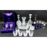 A group of glass wares including a Newcastle or Bell shaped Victorian decanter, 30cm high, a cut