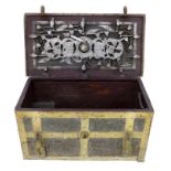 A 17th century heavy cast iron strong box or 'Armada' chest, probably German, with working key, of