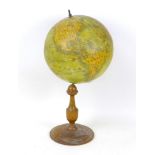 An early 20th century terrestial desk top Globe, 'The Earth' made by AK in Bavaria, with turned