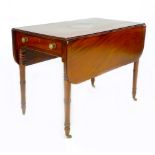 A Regency mahogany side table, drop leaves, with single frieze drawer, raised on turned legs and
