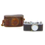 A vintage 1930s Leica camera, with Leitz Elmar 1:3.5 f=50mm lens, serial no. 168496, with chrome and