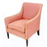 A Regency armchair, upholstered in pink and grey floral embroidered fabric, with tapering square