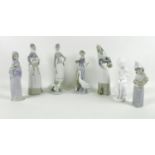 A group of six Lladro figurines, comprising Girl with Lamb, number 4584, designed by Antonio Ruiz,