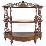 A George Spademan of Stamford, Victorian burr walnut buffet, of curved form, with carved top rail