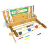 A Jaques 'Ascot' croquet set, circa 1990, in pine crate, with four mallets, three plastic balls,