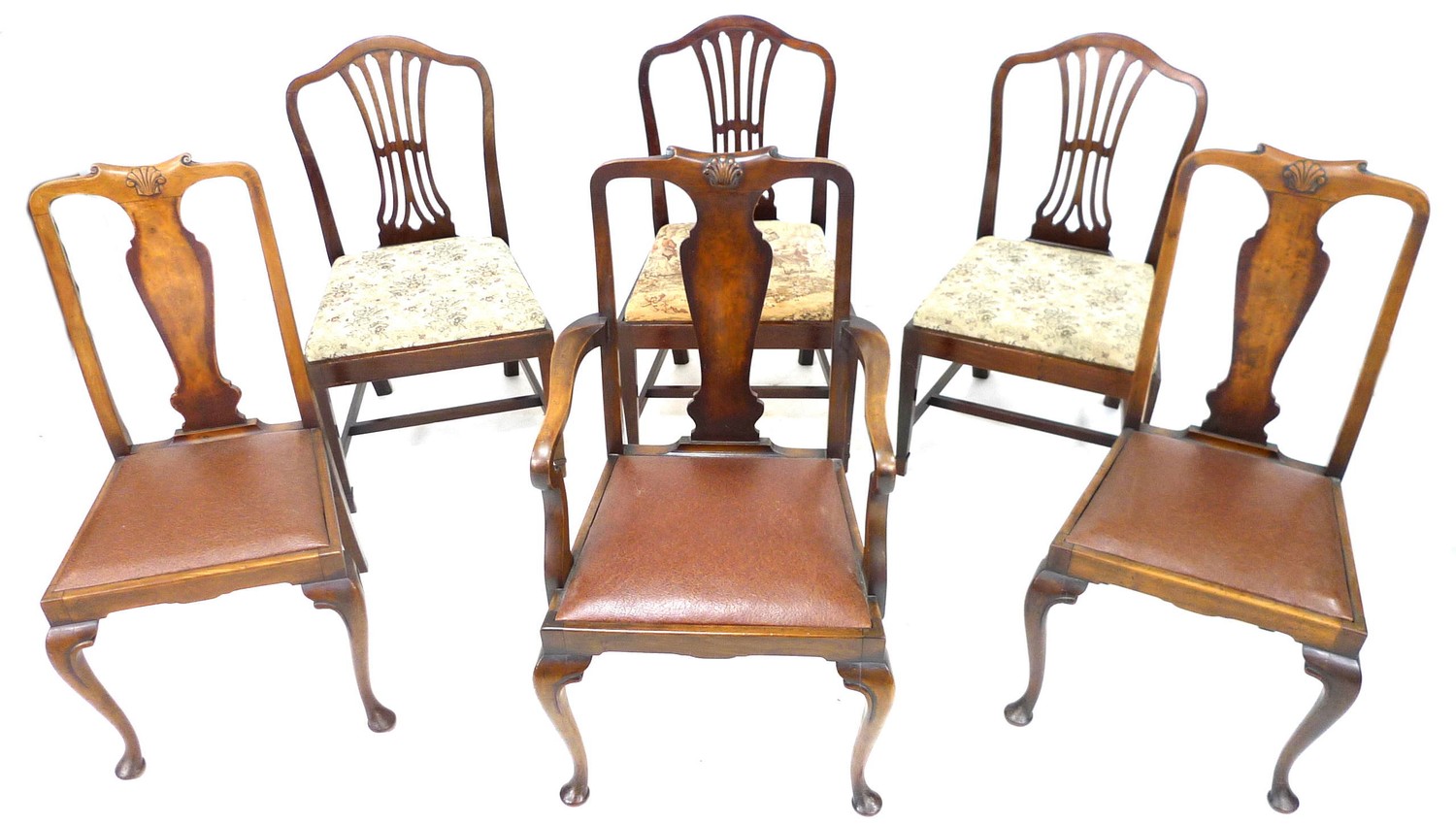 A dining table and six chairs, comprising two sets of three dining chairs comprising three with vase