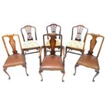 A dining table and six chairs, comprising two sets of three dining chairs comprising three with vase