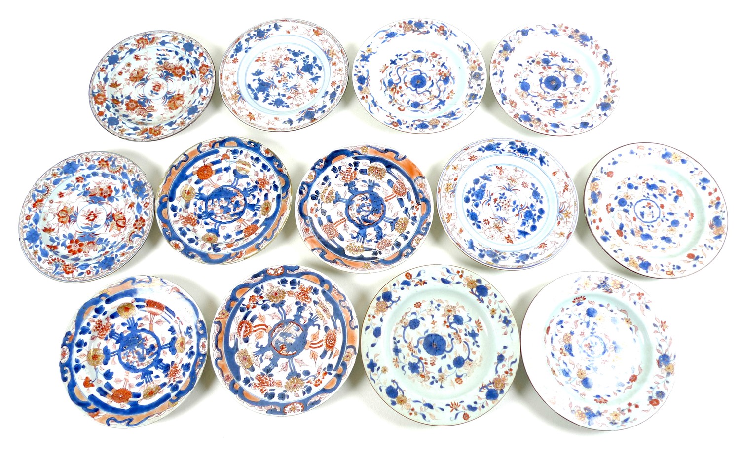 A group of thirteen 19th century Chinese Export porcelain circular dishes, all decorated in