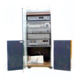 A modern stereo system, comprising NAD series 20 Power Amp 2140, Pre Amp 1020, CD player 5240,