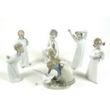 A group of six Lladro figures, comprising Wild Goose Chase, number 5553, 15cm high, Nino con