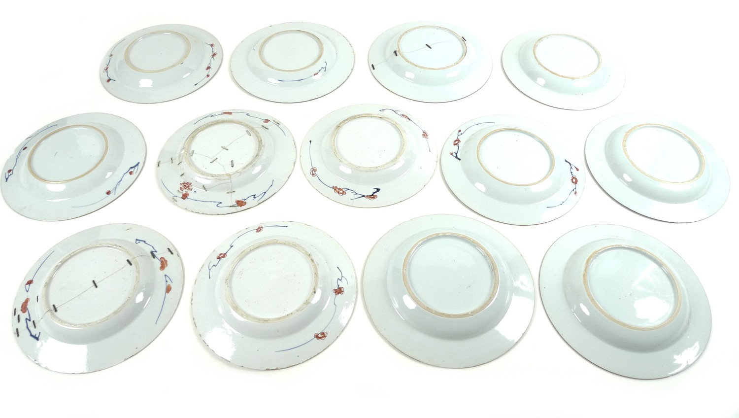 A group of thirteen 19th century Chinese Export porcelain circular dishes, all decorated in - Image 4 of 4