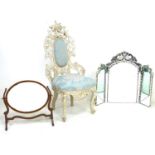 A Victorian nursing chair with cream painted carved frame, raised on cabriole legs to the front