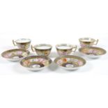 An English early 19th century part tea set, comprising four cups, 6cm high, and four saucers,