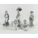 A group of five Lladro porcelain figures, including Fisherboy, number 4809, 21.5cm high, Boy with