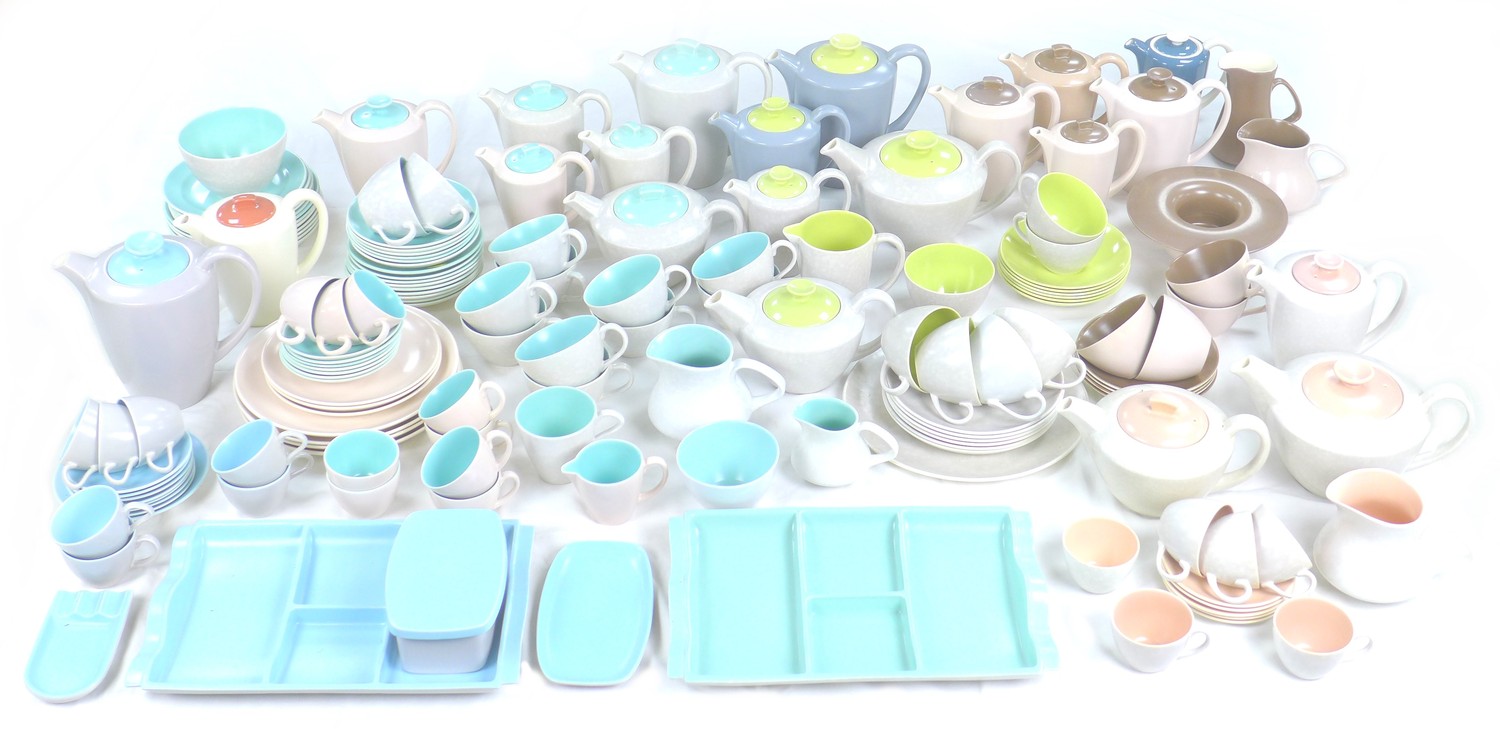 A group of over eighty pieces of vintage Poole Pottery tea wares, in seven different two-tone