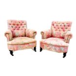 A pair of Victorian easy armchairs, in the style of Howard & Sons, upholstered in pink and grey