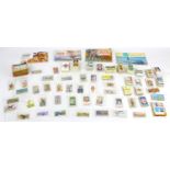 A large collection of cigarette cards and matchboxes and other ephemera,
