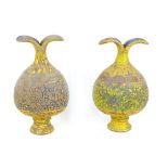 Two late 19th century Eastern papier mache vases, of bulb form, with flared petal like rims, one
